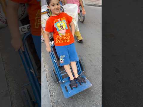 Zohair was tired of walking so he wanted a ride 😄 #enjoying #dubaistreet #shortsvideo