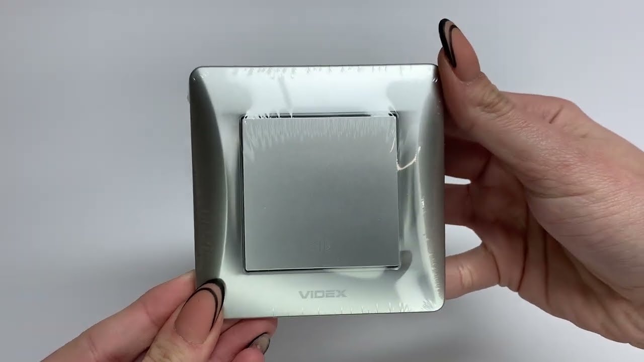 Выключатель одноклавишный промежуточный VIDEX Binera серебряный шёлк VF-BNSW1I-SS