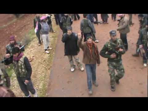 استعدادات مقاتلي كتيبة أبو عبيدة بن الجراح لبدء مجريات معركة السيطرة على حاجز السمان في محيط طيبة الإمام في ريف حماة