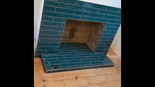 Preview of Before and after of a fireplace I recently completed using the Lampas Peacock tiles from Topps Tiles.