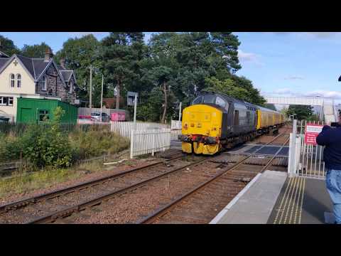 Direct Rail Services 37419 and 37405 pass Kingussie