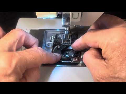 SINGER HEAVY DUTY-4423 REMOVING AND REPLACING THE BOBBIN CASE AND SETTING THE THREAD GAP (video 483)