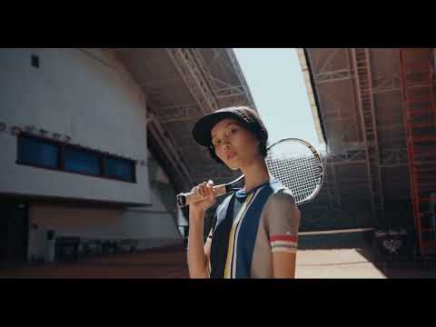 Woman Holding a Tennis Racket