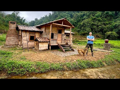 A beautiful house nestled in nature, creating a self-sufficient lifestyle.