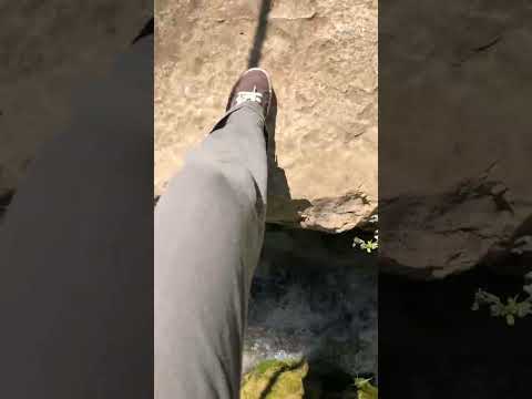 Hiking the Sentierelsa Trail Elsa Trail in Colle di Val d'Elsa, Italy - Crossing a Rope Bridge