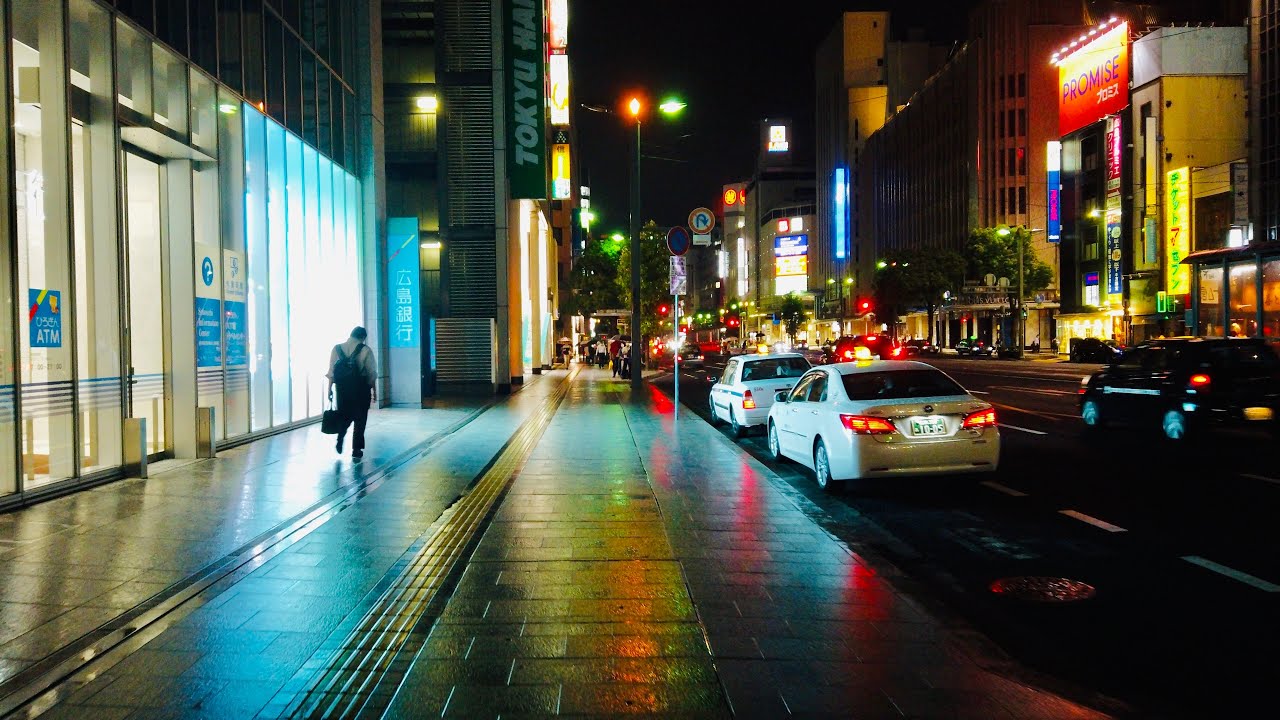 Immersive street-level walking tour through Hiroshima, Japan, showcasing authentic urban landscapes, local architecture, and the vibrant atmosphere of the city's neighborhoods