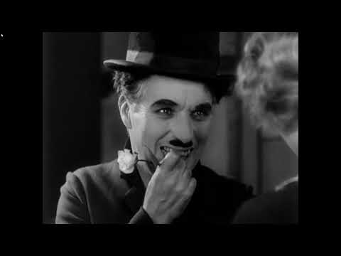 Charlie Chaplin e Virginia Cherrill "Lo splendido e dolce finale" - Luci della città, 1931