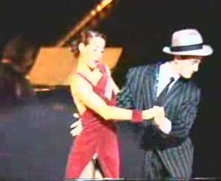  Gustavo Russo  and  Alejandra Mantinan  are  dancing  to  the  milonga  "  La Luciernaga  "