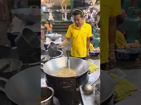Amazing street food master chef making sticky soup for noodle or Rard Na - thai street food