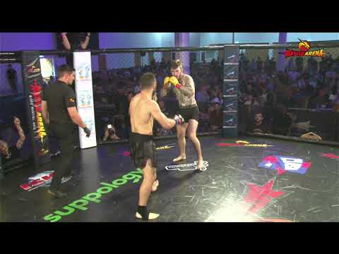 crazy round house kick knocks opponent out on the buzzer listen to it connect