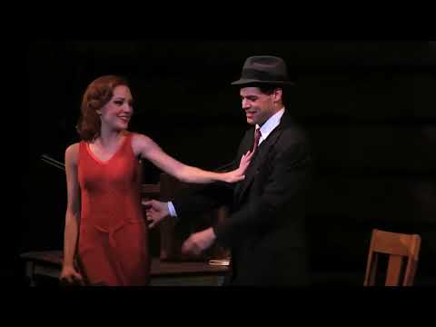 Trailer shot of getaway car headlights and period suits from the Broadway clips