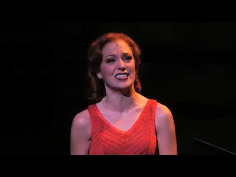 Close-up trailer frame of Bonnie and Clyde facing each other with tension and intimacy