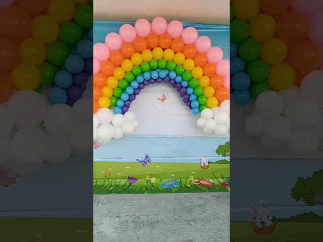Vídeo relacionado con OSDUE Decoración para tartas de feliz cumpleaños y fiestas temáticas de nubes de globos arcoíris, figuras de globos de arcoíris