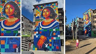 Más de 100.000 tapas de plástico completan el mural reciclado más alto del mundo en El Salvador