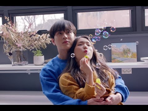 Watch: Highlight’s Yong Junhyung Gets Caught In A “Sudden Shower” In MV For Solo Comeback