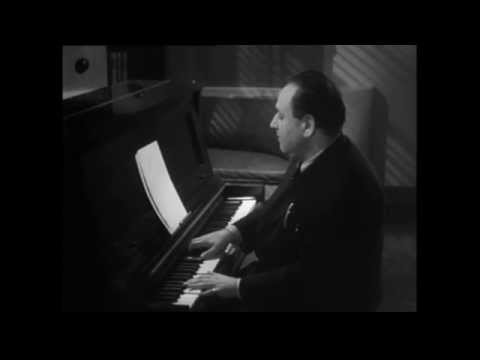 Footage of Erich Wolfgang Korngold (playing the piano)