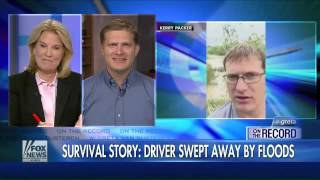 Caught on Camera: Stranded in a tree, surrounded by a flood