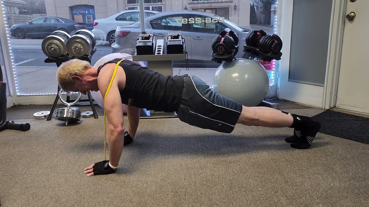 BAND RESISTED PUSHUPS