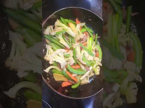 beef stir fry in snowflakes with cauliflower,carrots...