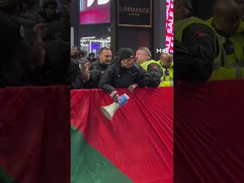 Giant Palestinian flag unfurled at Westfield Stratford during protest