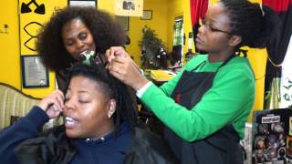 Isis speaks with YoYo and Kenya while instructing Kenya on her lesson today.