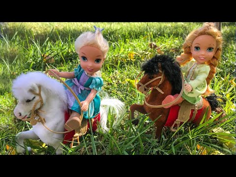 Elsa and Anna toddlers at the horse riding club