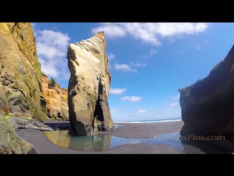 Exploring the Sea Caves of Three Sisters Beach in the Taranaki Region, New Zealand