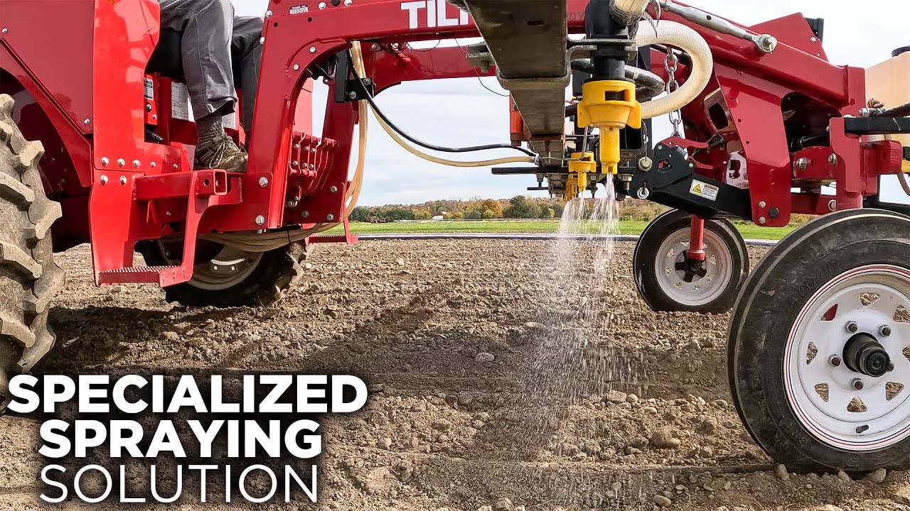 Small Plot Herbicide Sprayer On A Tilmor Cultivating Tractor