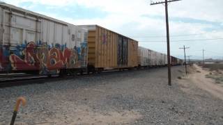 preview picture of video 'Three Southbound Trains Around Mojave HD'