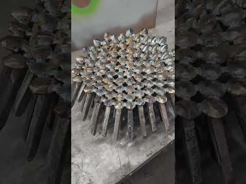 Railroad spike sculpture in process - Kevin Caron