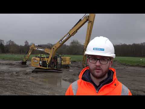 Flannery Plant Hire working with a long reach Cat