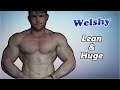 huge lean bodybuilder flexing recently shaven