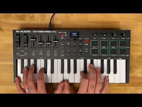 M-AUDIO Oxygen Pro Mini 32-Key USB MIDI Keyboard Controller for MacOS and WinOS, with Beat Pads, Assignable Knobs and Faders, and Native Instruments Sound Pack (NKS Integration) video review thumbnail
