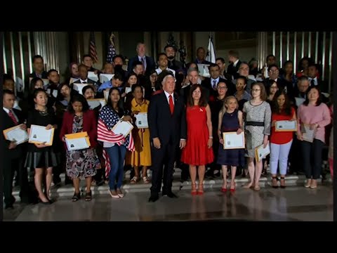 Vice President Mike Pence told more than 40 immigrants who became new U.S. citizens after taking the oath of citizenship at the National Archives in Washington to "find a way to give back for all that you've been given." (July 4)