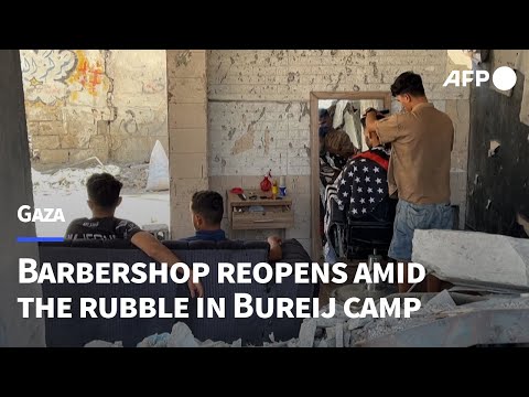 Barbershop reopens amid the rubble in Bureij camp in Gaza | AFP