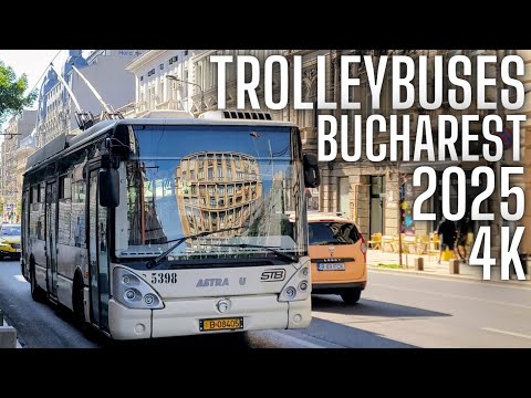 Trolleybus Vehicles Passing by on Historic City Street in Bucharest