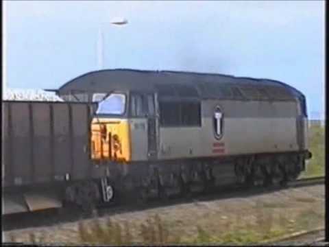 56018 works a ballast through Abergele