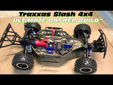 Traxxas Slash 4x4 “ULTIMATE BASHER BUILD” // UPGRADES // SHOCKS & TIRES!