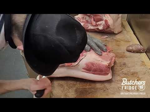 Breaking down a pig and rolling pork shoulder by Masterbutcher Ale