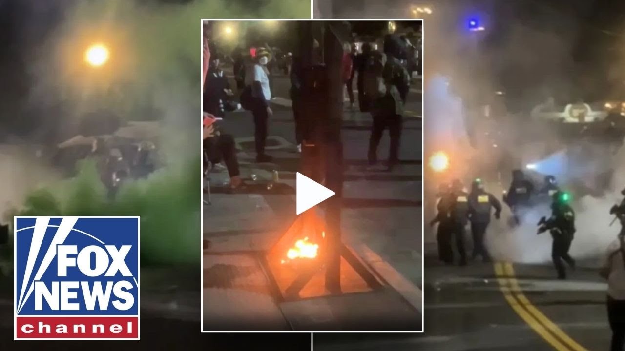 'TONE IT DOWN': Protesters with guillotine clash with police in war-like scenes