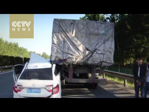 Footage: Speeding car misjudges overtake, smashes into truck