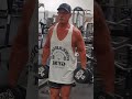 Coach Bill shows proper form during the exercise front bicep raises