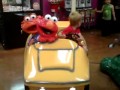 Domanic Riding With Elmo