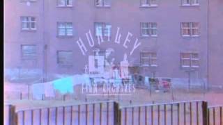 Easterhouse, Glasgow filmed from a car.  Archive film 93656