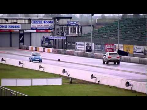 SureMen V8 Races: Think City Electric Car Vs BMW X5 V8