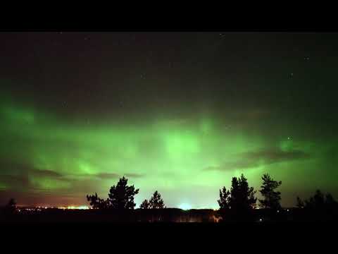 Aurora lights above Umeå city, Sweden, view from the south Umeå river delta  region.