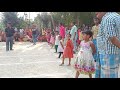 Kids Biscuit Race. It is an entertaining game for village children.