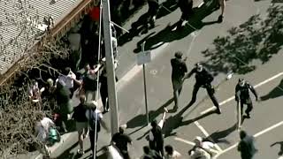 Police clash with protesters in Melbourne