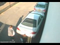 Security cameras recording to thieves stealing license plate from a car Security cameras recording to thieves stealing license plate from a car