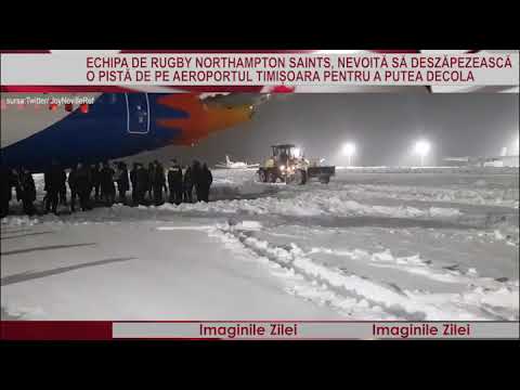 IMAGINILE ZILEI 18 Decembrie - Echipa de rugby deszăpezește o pistă a aeroportului Timișoara